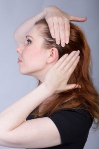 slicking back hair with gel