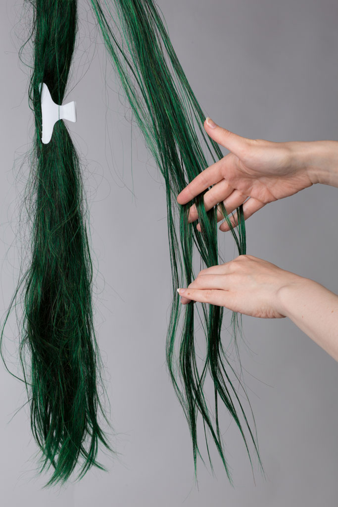 wig hair and fingers