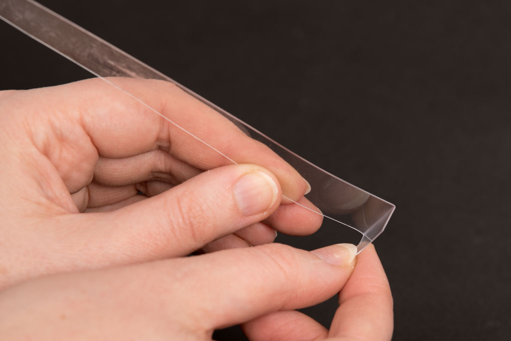 plastic strip with bent end