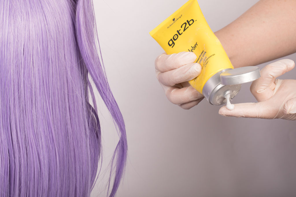 hair glue applied to a finger