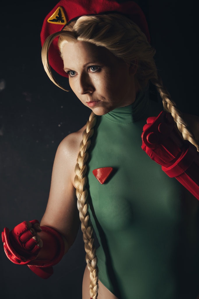 cosplayer wearing a blond braided wig